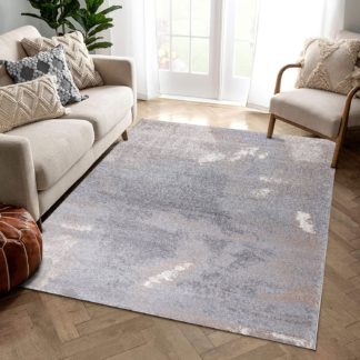 Lyhytnukkainen, hillitysti kuvioitu harmaansävyinen Opal Mona-matto valoisan huoneen kalanruotoparkettilattialla keskilattiamattona.