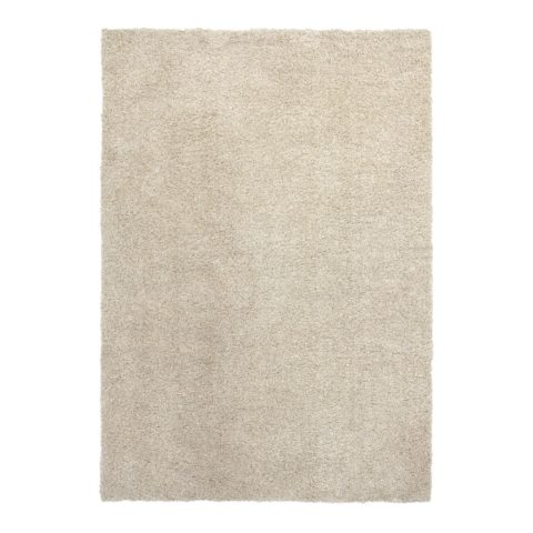 Matalanukkainen, suorakaiteen muotoinen beige Serene-matto.