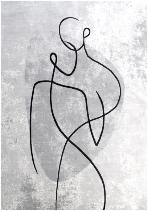 Luonnonvalkoinen, modernisti mustalla kuvioitu Art Figure-viskoosimatto.