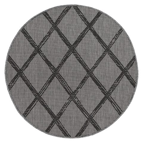 Pyöreä sileäpintainen harmaa-musta Verdi Ona matto sisä- ja ulkokäyttöön. Harmaalla pohjalla musta salmiakkikuosi..