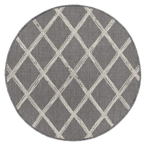 Pyöreä sileäpintainen harmaa-valkoinen Verdi Ona matto sisä- ja ulkokäyttöön. Harmaalla pohjalla valkoinen salmiakkikuosi..