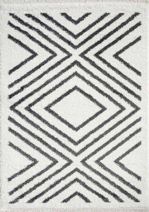 Valkoinen, mustalla kuvioitu hapsullinen Sofi Deco-käytävämatto.